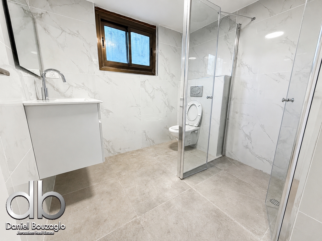 Garden Apartment for Sale in pastoral Old Katamon
