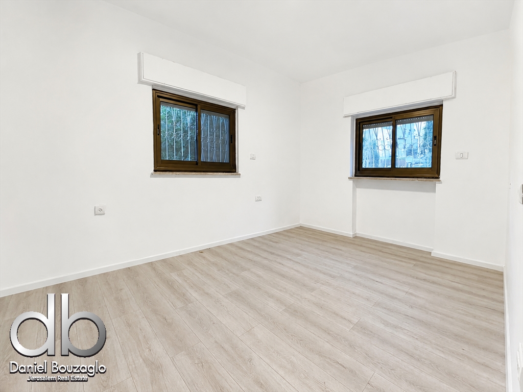 Garden Apartment for Sale in pastoral Old Katamon